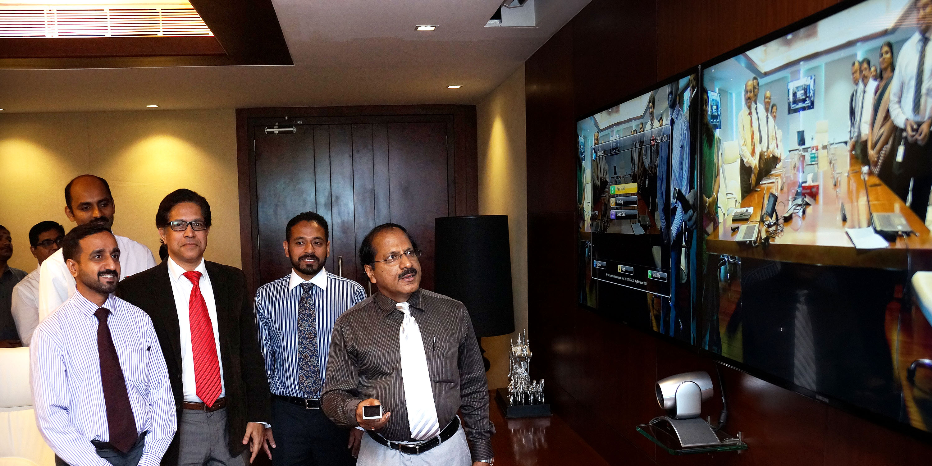 Mr. V.P. Nandakumar launches the newly set up video conferencing facility connecting regional offices of the company with its H O at Valapad.